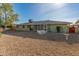 Spacious backyard with gravel and patio furniture at 12734 W Crystal Lake Dr, Sun City West, AZ 85375