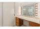 Bright bathroom with a vanity, large mirror, and toilet at 12734 W Crystal Lake Dr, Sun City West, AZ 85375