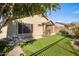 Backyard with putting green and covered patio at 15165 N 102Nd Way, Scottsdale, AZ 85255