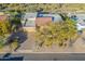 Aerial view of a single-story home with a tile roof, desert landscaping, and a brick driveway at 15838 E Thistle Dr, Fountain Hills, AZ 85268