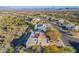 High aerial view showcasing a neighborhood with mountain views and a desert environment at 15838 E Thistle Dr, Fountain Hills, AZ 85268