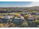 An aerial view of this community showcasing beautiful homes with desert landscaping at 15838 E Thistle Dr, Fountain Hills, AZ 85268