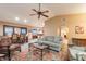 Open-concept living area featuring a neutral color palette and connecting dining space at 15838 E Thistle Dr, Fountain Hills, AZ 85268