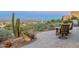 Beautiful patio featuring desert landscaping, mountain views, and comfortable outdoor seating at 15838 E Thistle Dr, Fountain Hills, AZ 85268