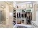 Large walk-in closet with ample shelving and hanging space at 15957 E Ridgestone Dr, Fountain Hills, AZ 85268