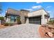 Craftsman style home with stone accents and a 3-car garage at 15957 E Ridgestone Dr, Fountain Hills, AZ 85268