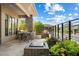 Outdoor kitchen and patio area with seating and water feature at 15957 E Ridgestone Dr, Fountain Hills, AZ 85268