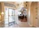 Inviting entryway with tile flooring and views into an office at 15973 W Sheila Ln, Goodyear, AZ 85395