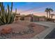 Single-story home with desert landscaping and two-car garage at 15973 W Sheila Ln, Goodyear, AZ 85395