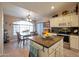 Kitchen with an island, stainless steel appliances, and plenty of cabinet space at 15973 W Sheila Ln, Goodyear, AZ 85395