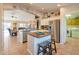 Spacious kitchen with island, stainless steel appliances, and ample counter space at 15973 W Sheila Ln, Goodyear, AZ 85395