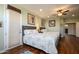 Guest bedroom with two twin beds and ceiling fan at 16442 W Quarry Ct, Surprise, AZ 85374