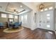 Elegant entryway with hardwood floors, double doors, and a chandelier at 16442 W Quarry Ct, Surprise, AZ 85374