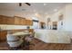 Spacious kitchen featuring ample cabinetry and an island with seating at 16442 W Quarry Ct, Surprise, AZ 85374