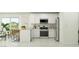 Modern white kitchen with stainless steel appliances at 17500 N Toledo Ave, Maricopa, AZ 85138