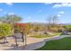 Relaxing backyard oasis with mountain views, paved patio, and artificial turf at 17674 E Fort Verde Rd, Rio Verde, AZ 85263