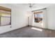 Bright bedroom with carpet flooring and large window at 17674 E Fort Verde Rd, Rio Verde, AZ 85263