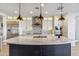 Modern kitchen with white cabinets and a gas cooktop at 17674 E Fort Verde Rd, Rio Verde, AZ 85263