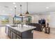 Modern kitchen island with white quartz countertop at 17674 E Fort Verde Rd, Rio Verde, AZ 85263