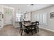 Bright dining area with wood table and kitchen island at 1830 S Yucca St, Chandler, AZ 85286