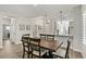 Modern dining area with wood table and kitchen view at 1830 S Yucca St, Chandler, AZ 85286