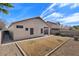 Back exterior view of house and yard at 1830 S Yucca St, Chandler, AZ 85286