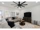 Relaxing living room with sectional sofa and ceiling fan at 1830 S Yucca St, Chandler, AZ 85286