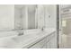 Bright bathroom with double vanity, shower, and bathtub at 19457 W Highland Ave, Litchfield Park, AZ 85340