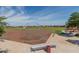 Baseball field with benches and backstop in community park at 19726 W Morning Glory St, Buckeye, AZ 85326