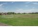 Community park with soccer goals and open green space at 19726 W Morning Glory St, Buckeye, AZ 85326