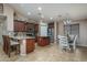 Modern kitchen with island, stainless steel appliances, and ample cabinetry at 19726 W Morning Glory St, Buckeye, AZ 85326