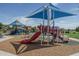 Play area with slides and climbing toys at 19726 W Morning Glory St, Buckeye, AZ 85326