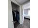 Bedroom closet with hanging clothes and shelf at 19851 N Greenview N Dr, Sun City West, AZ 85375