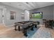 Game room featuring a pool table and large screen TV at 21622 E Via De Arboles --, Queen Creek, AZ 85142