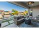 Relaxing patio with wicker furniture and fire pit, overlooking the pool at 21622 E Via De Arboles --, Queen Creek, AZ 85142