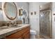 Bathroom with unique sink and shower stall at 22206 N La Senda Dr, Scottsdale, AZ 85255