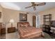 Cozy bedroom with striped bedding and large window at 22206 N La Senda Dr, Scottsdale, AZ 85255