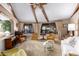 Living room with large windows, comfy seating, and a classic style at 22206 N La Senda Dr, Scottsdale, AZ 85255