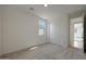 Cozy bedroom featuring neutral tones, window view, and a convenient closet for storage at 24248 W Agora Ln, Buckeye, AZ 85326