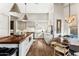 Bright kitchen with hardwood floors, a butcher block island and modern light fixtures at 2625 N 24Th St # 36, Mesa, AZ 85213