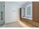 Modern bathroom with floating vanity, large mirror and glass shower at 28110 N 96Th Pl, Scottsdale, AZ 85262