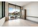 Bedroom with sliding glass doors opening to a pool view at 28110 N 96Th Pl, Scottsdale, AZ 85262