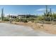 Modern home with desert landscaping and driveway at 28110 N 96Th Pl, Scottsdale, AZ 85262