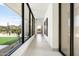 Bright hallway with tile floors and large windows at 28110 N 96Th Pl, Scottsdale, AZ 85262