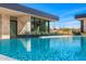 Beautiful modern pool with a desert landscape, reflecting the sky and architecture, creating a serene outdoor retreat at 28110 N 96Th Pl, Scottsdale, AZ 85262