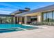 Luxury home featuring a modern pool and spa with desert landscape at 28110 N 96Th Pl, Scottsdale, AZ 85262