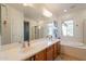 Bathroom with double vanity, soaking tub and shower at 28731 N 20Th Ln, Phoenix, AZ 85085