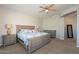 Main bedroom with carpeted floor and ceiling fan at 28731 N 20Th Ln, Phoenix, AZ 85085