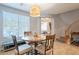 Dining area with round table, chairs, and built-in bench seating at 28731 N 20Th Ln, Phoenix, AZ 85085