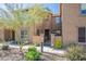 Tan stucco home with stone accents and a landscaped front yard at 28731 N 20Th Ln, Phoenix, AZ 85085